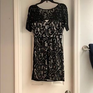 Lace dress with white silk underneath